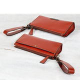 Caravel Wristlet Clutch - Luxury Leather Handbag in Cognac